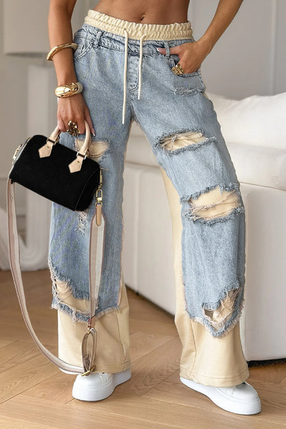 Damen-Jeanshose mit Nähten und Rissen 