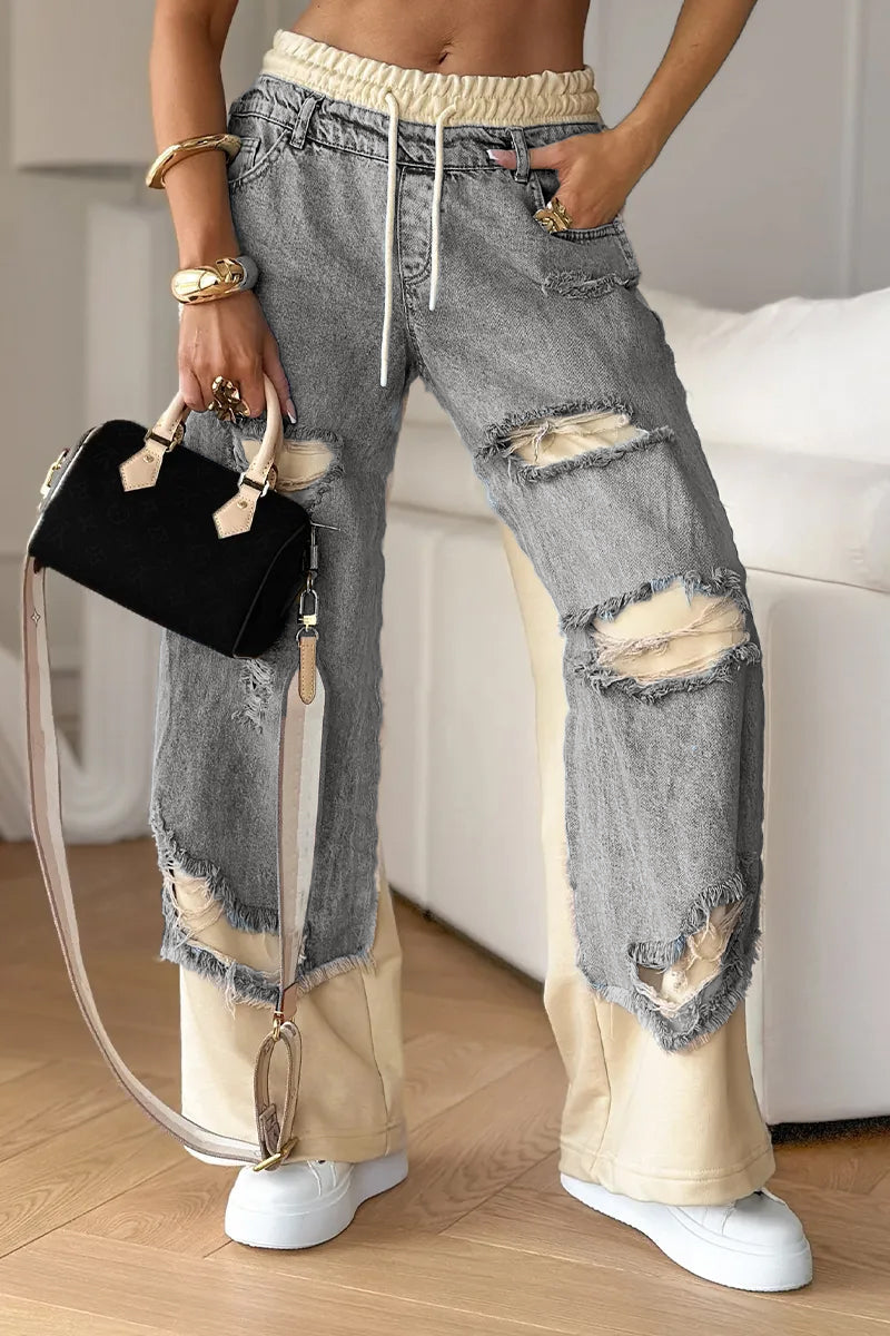 Damen-Jeanshose mit Nähten und Rissen 
