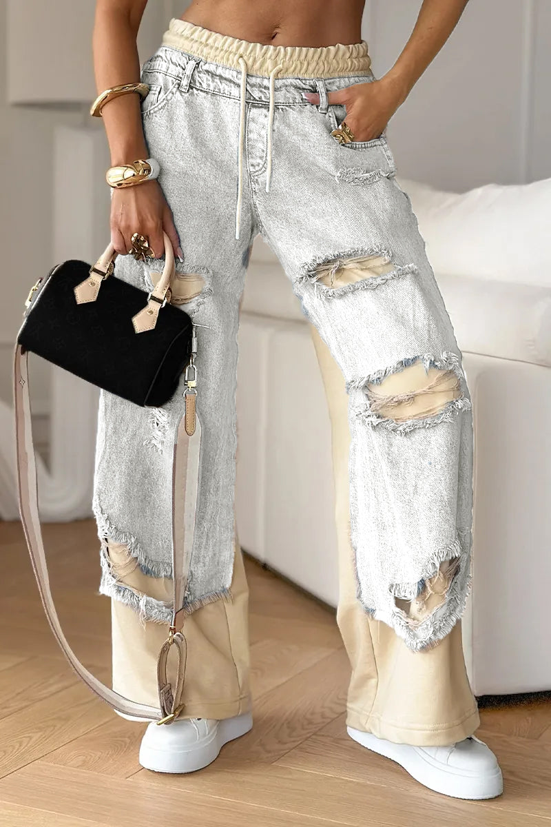 Damen-Jeanshose mit Nähten und Rissen 